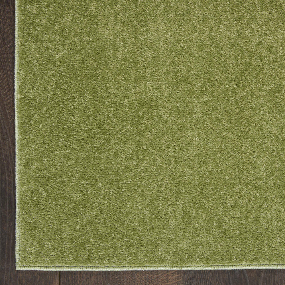 Nourison Essentials Green Area Rug 2' x 6' on patio