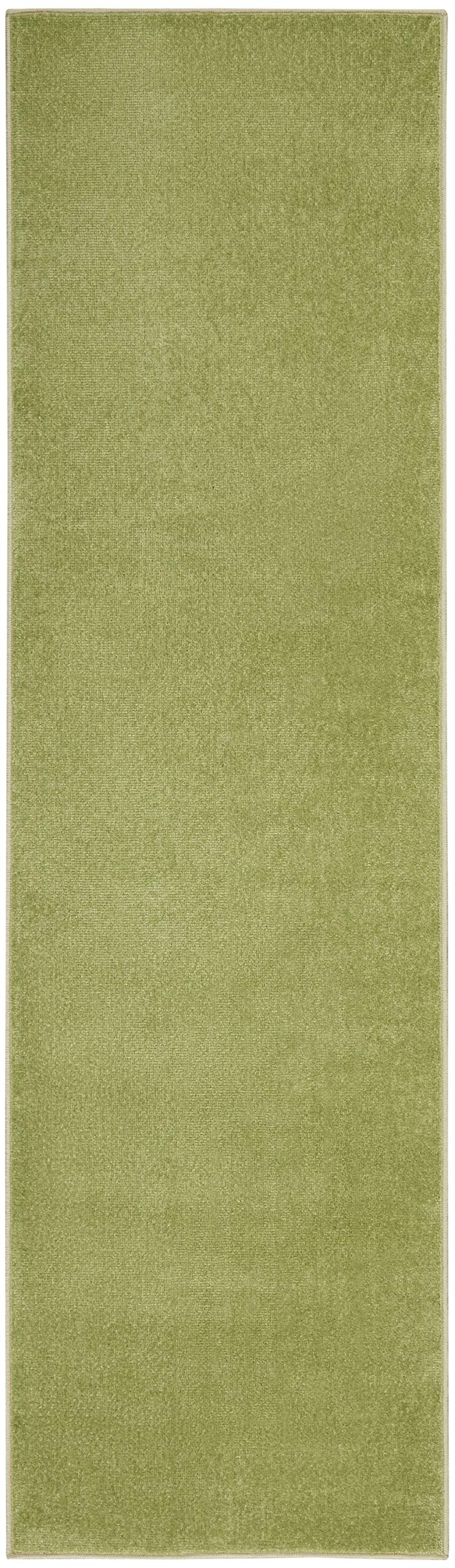 Nourison Essentials Green Area Rug 2' x 6' rolled up for storage