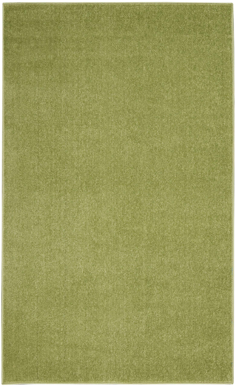 Nourison Essentials Green Area Rug in living room