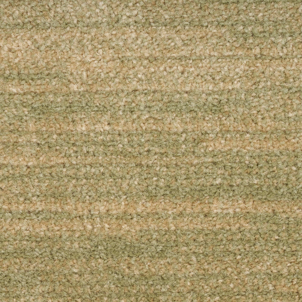 Nourison Essentials Green Gold Outdoor Rug in living room