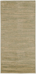 Nourison Essentials Green Gold Rug in a living room setting
