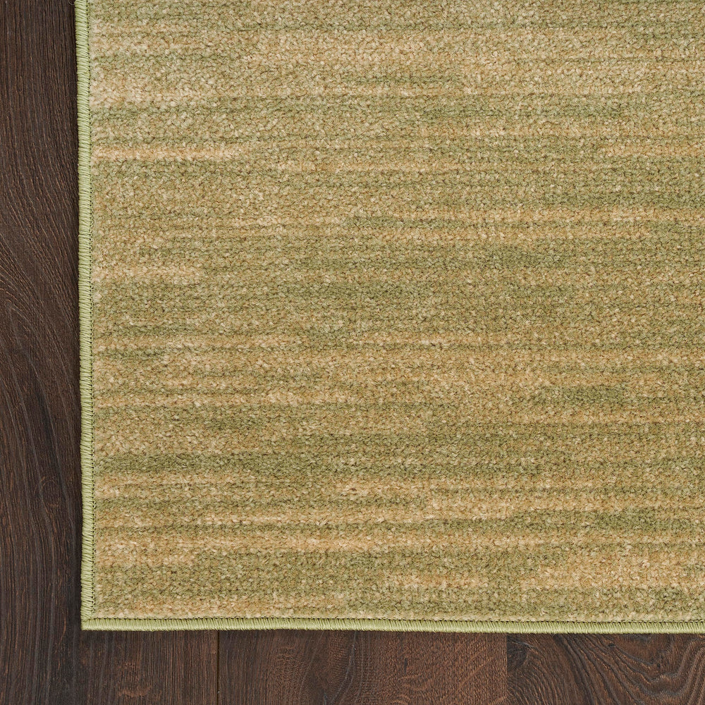 Nourison Essentials Green Gold rug near doorway