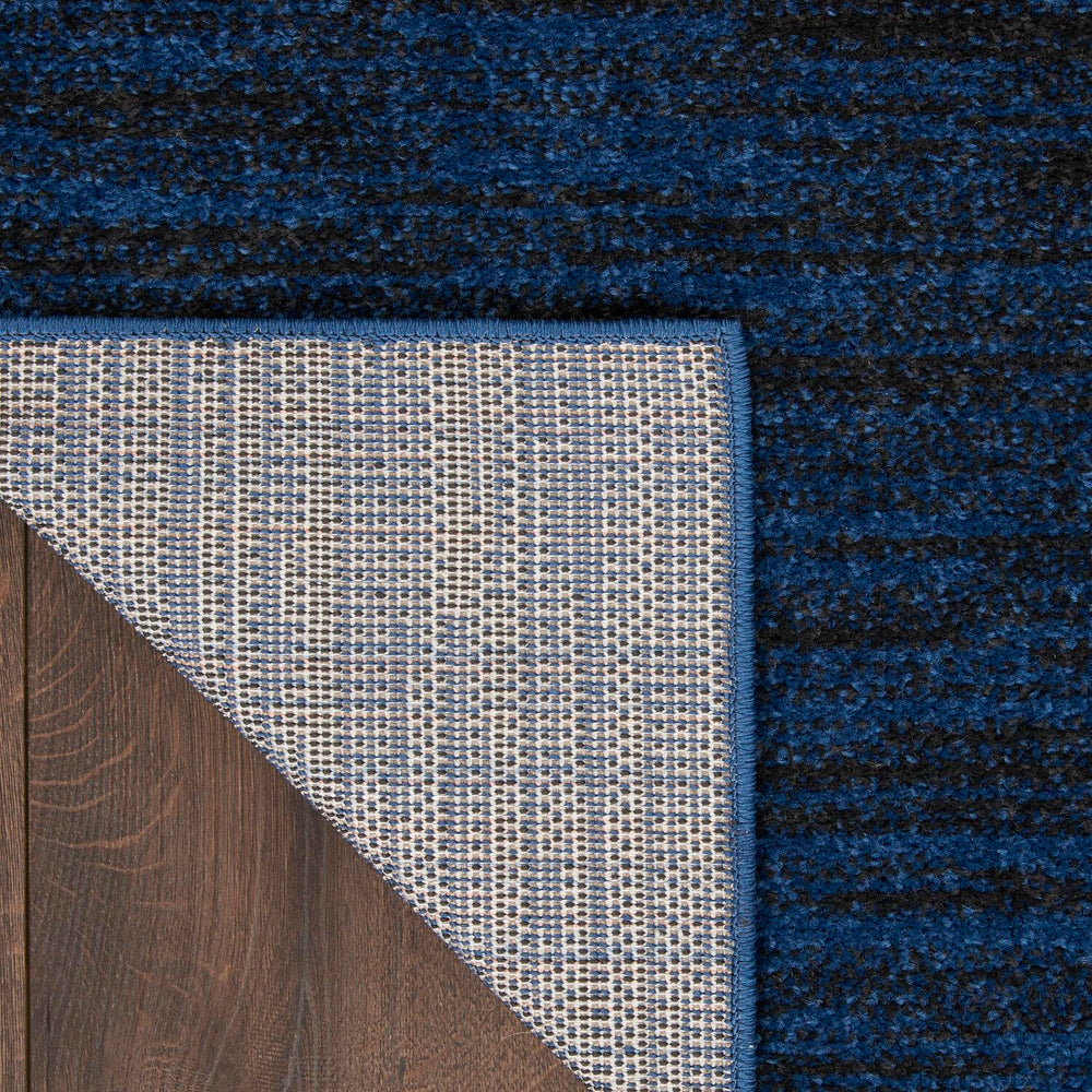Nourison Essentials Midnight Blue Area Rug in living room