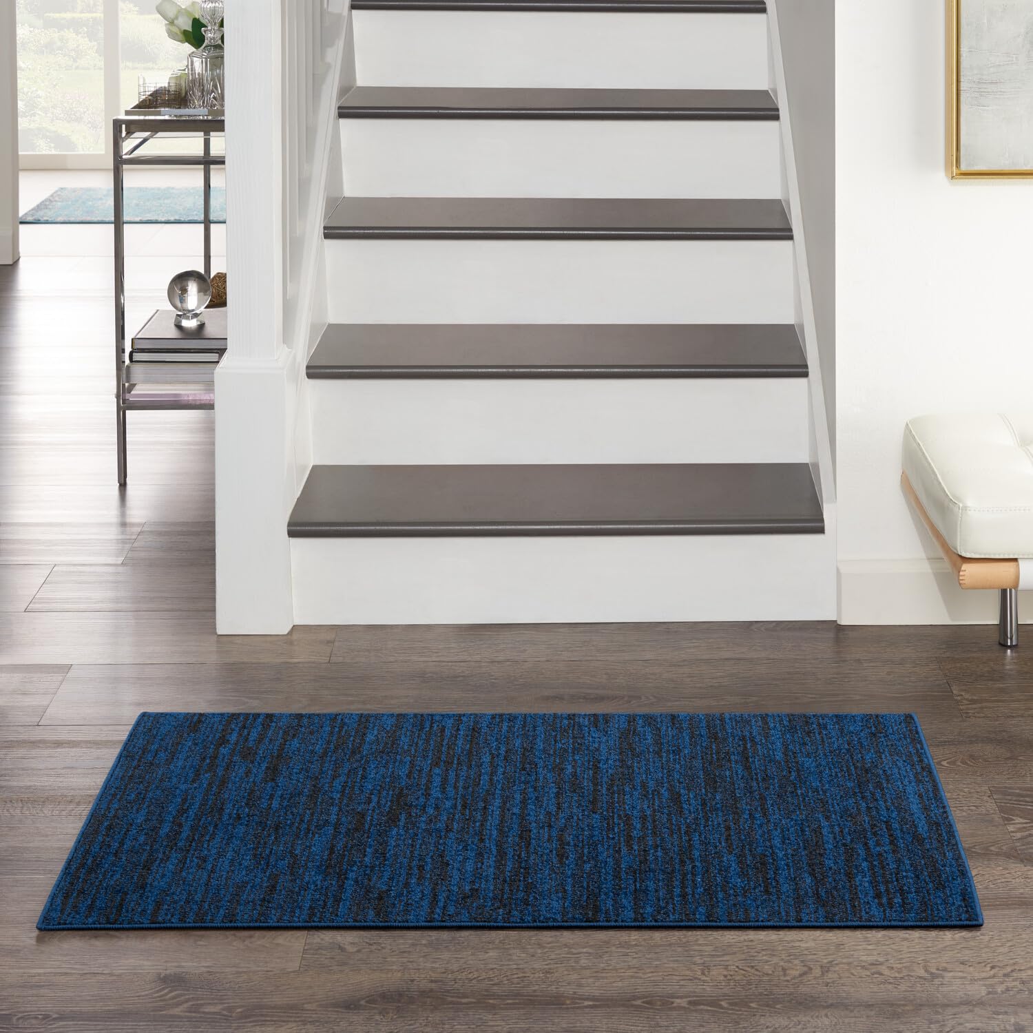 Nourison Essentials Midnight Blue Area Rug on patio