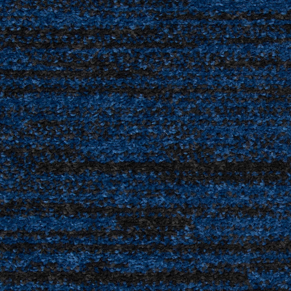 Nourison Essentials Midnight Blue Area Rug outdoor setting