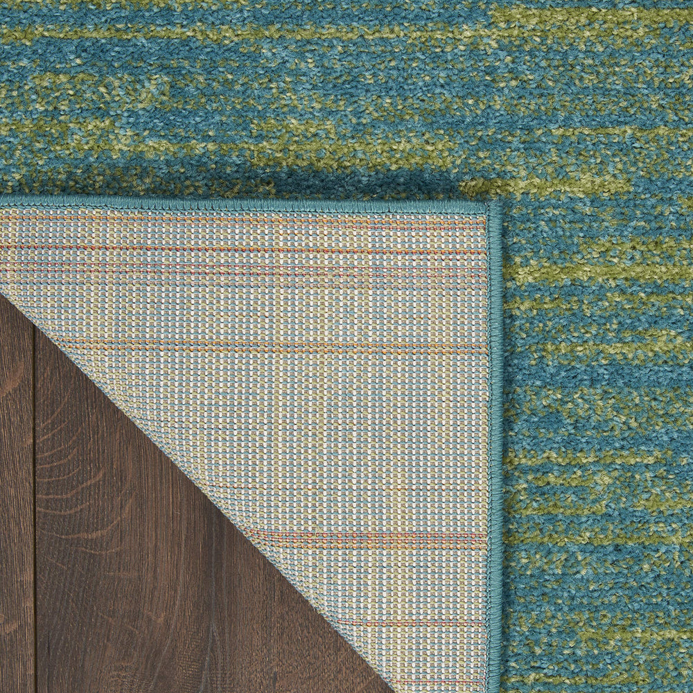 Nourison Essentials rug laid out in living room