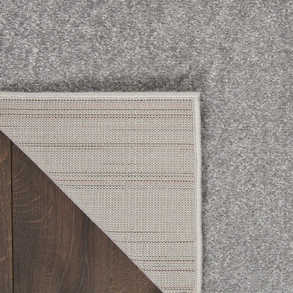 Nourison Essentials rug placed under furniture