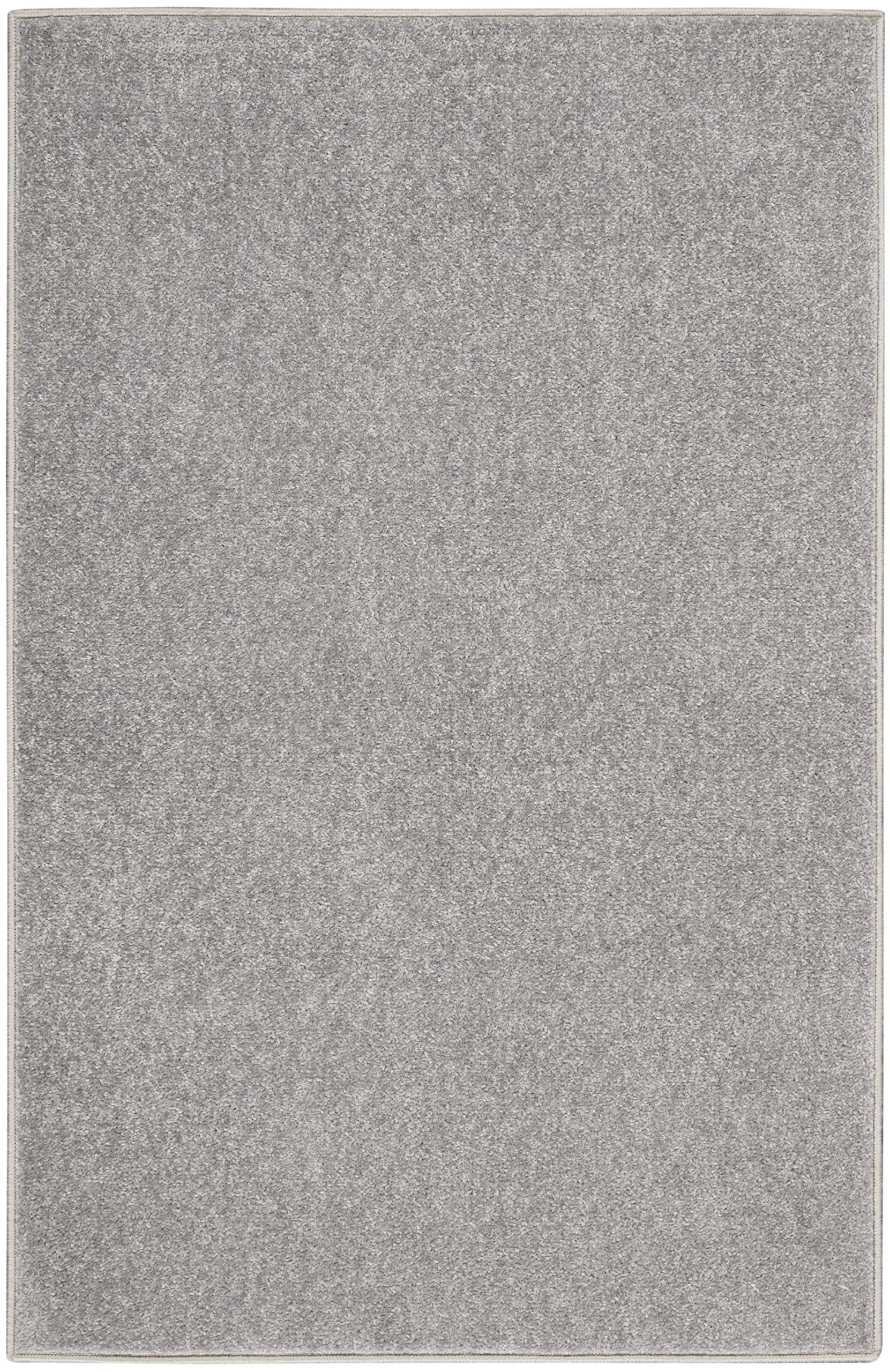 Nourison Essentials rug showing low pile design