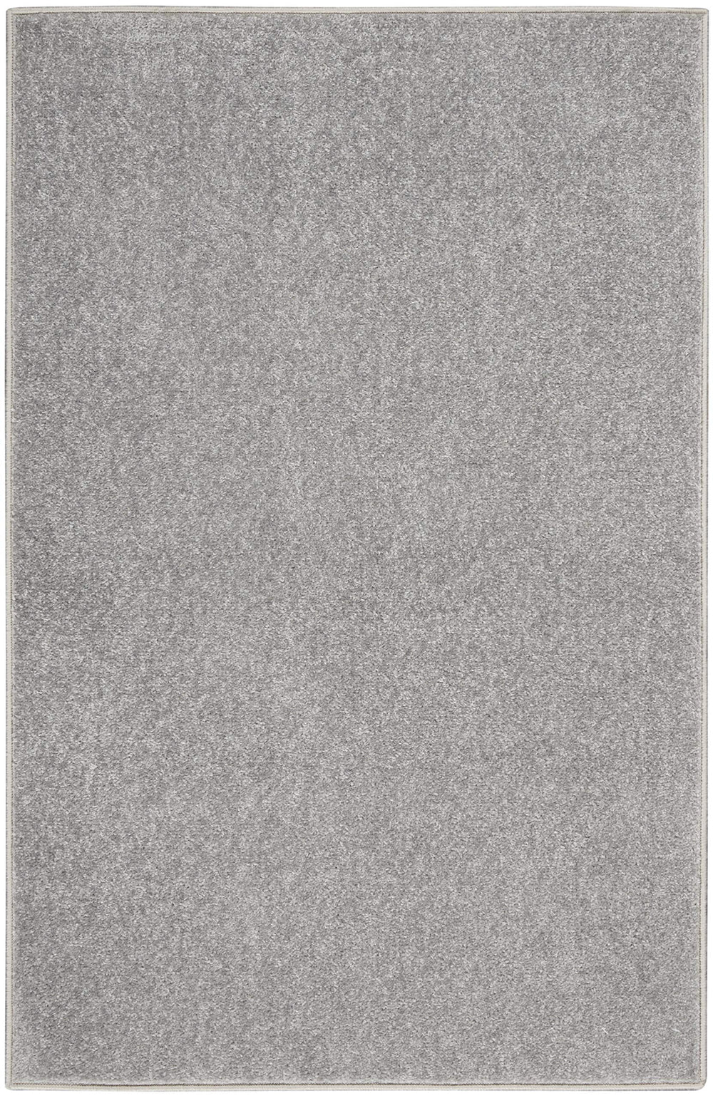 Nourison Essentials rug showing low pile design