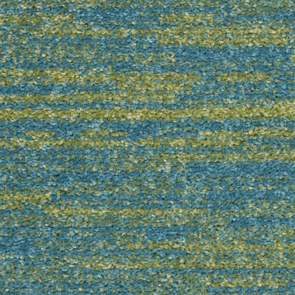 Nourison Essentials rug with layered patterned rug
