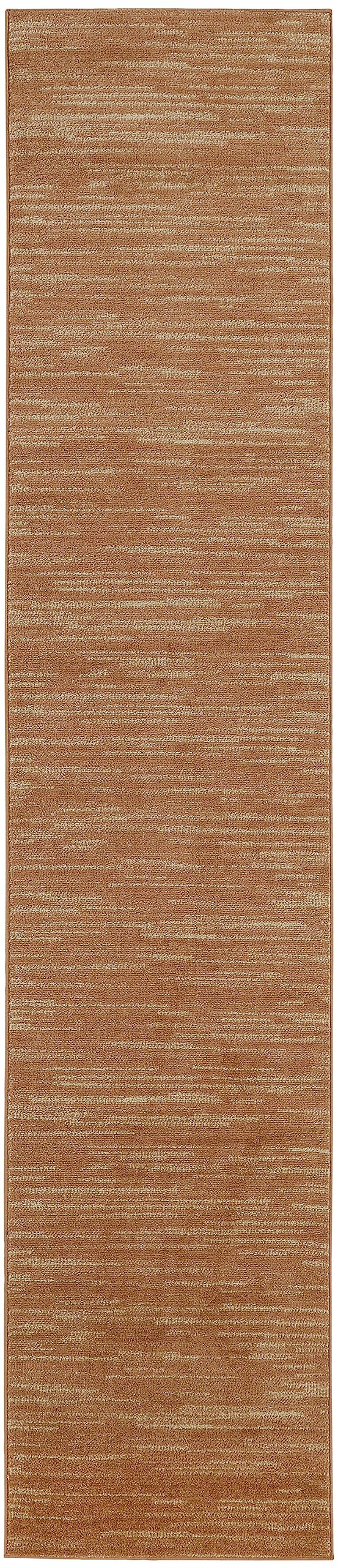 Nourison Essentials Rust Outdoor Rug on patio