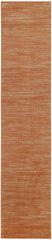 Nourison Essentials Rust Outdoor Rug on patio