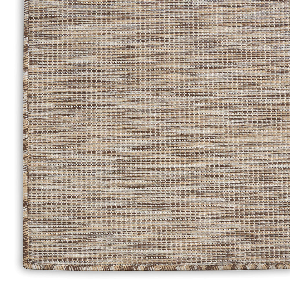 Nourison Positano beige runner rug showing its lightweight design