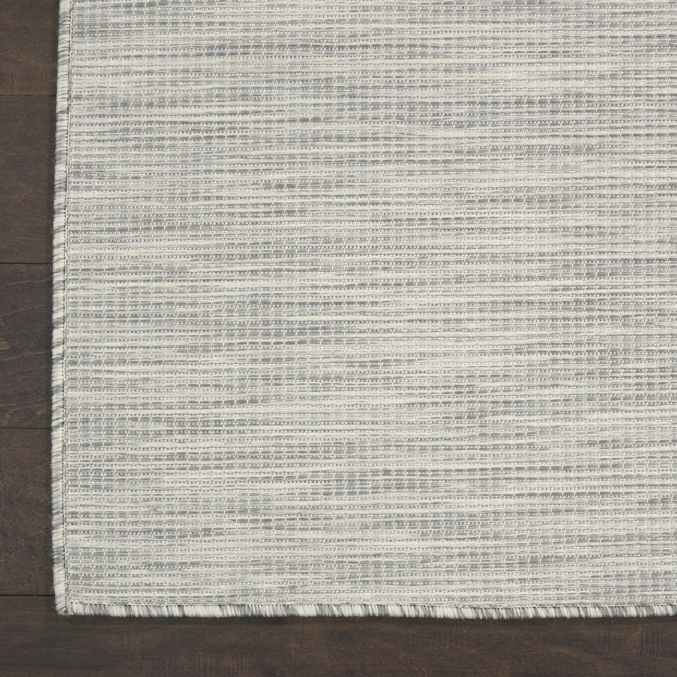 Nourison Positano Light Grey rug in a living room setting