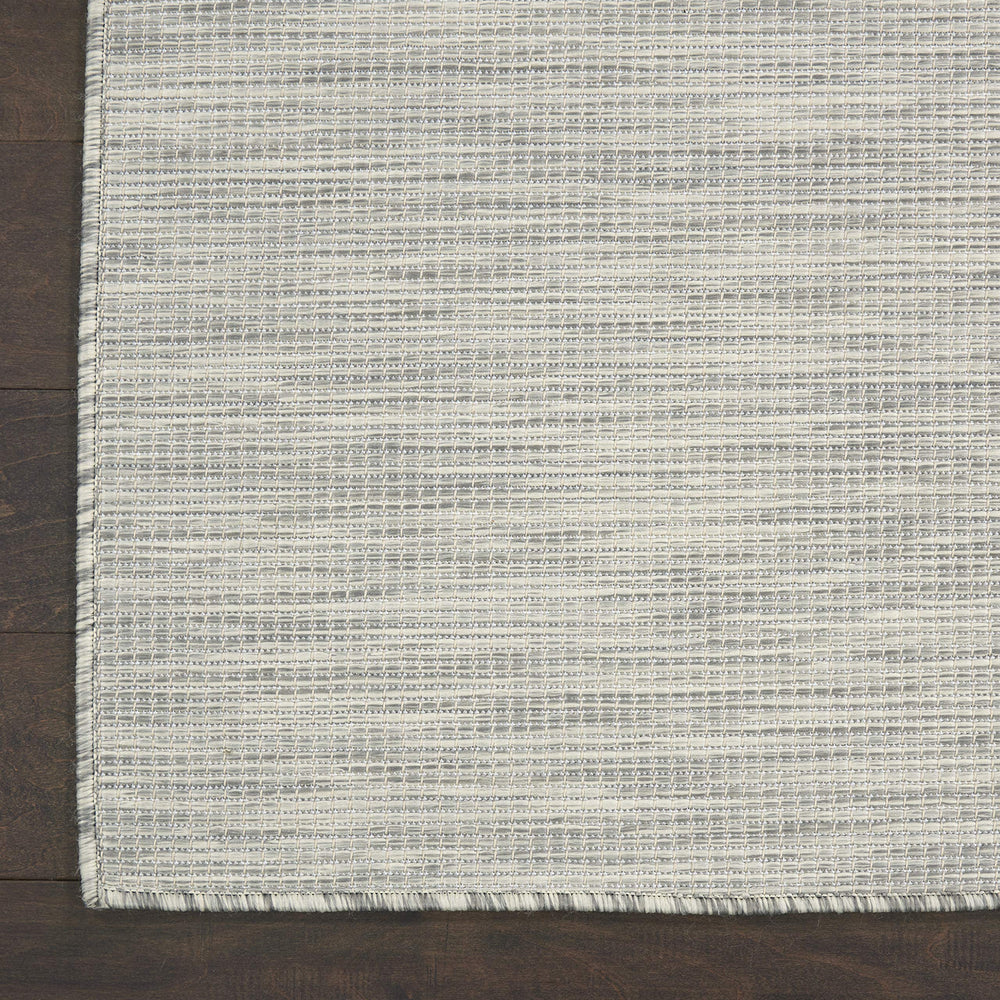Nourison Positano Light Grey rug in a living room setting