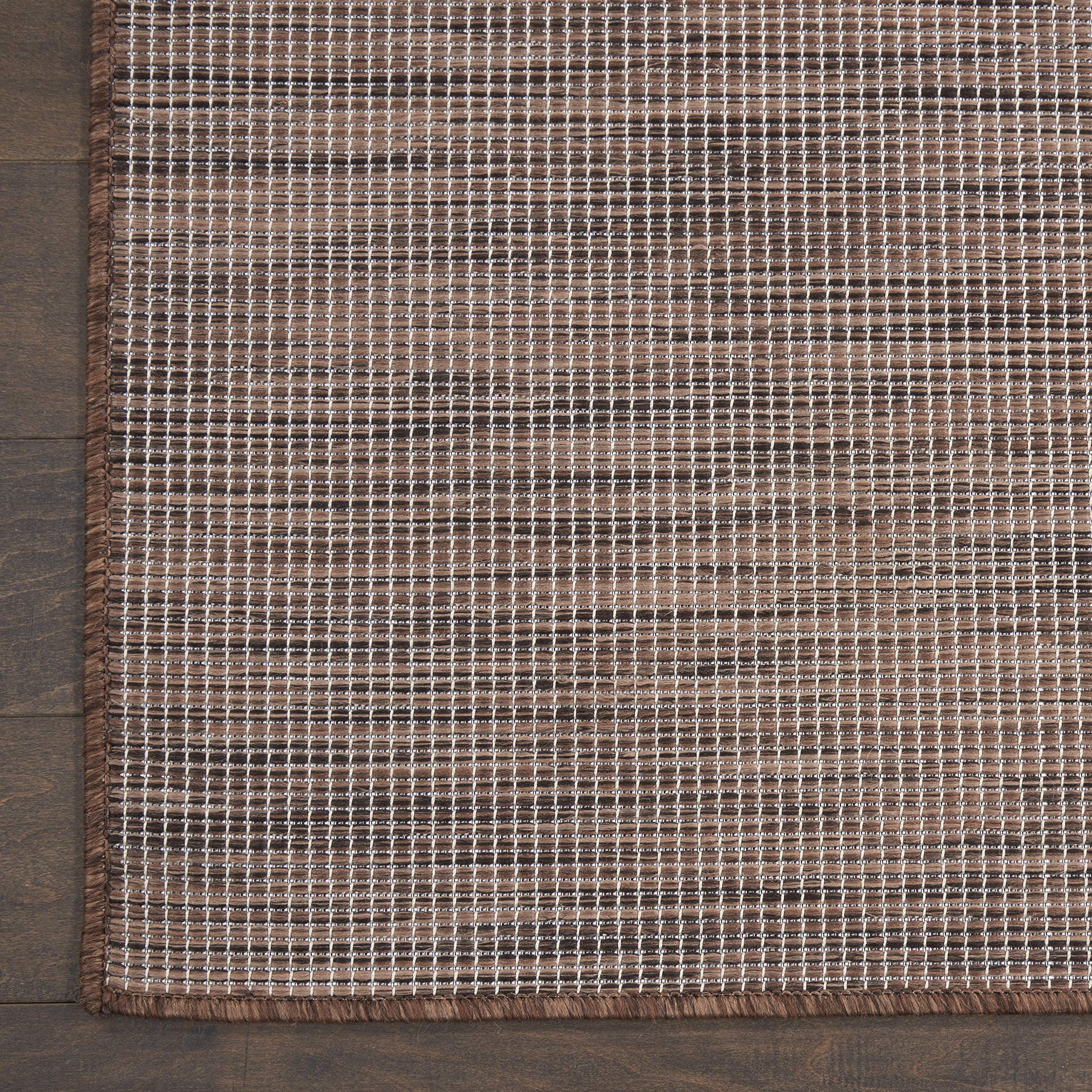 Nourison Positano Natural outdoor rug showing colour variations