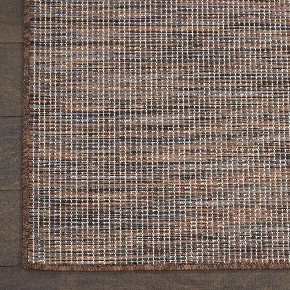 Nourison Positano Natural outdoor rug showing colour variations