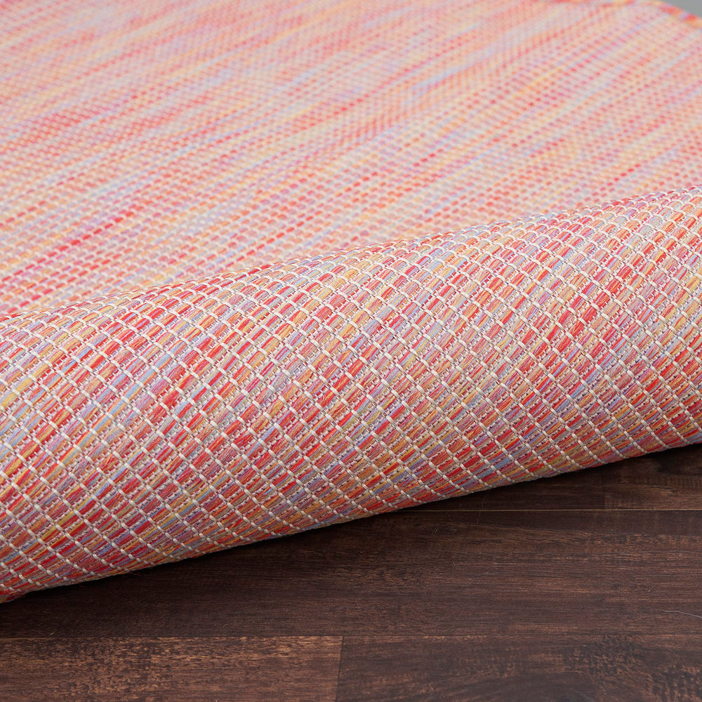 Nourison Positano Rainbow outdoor rug in garden