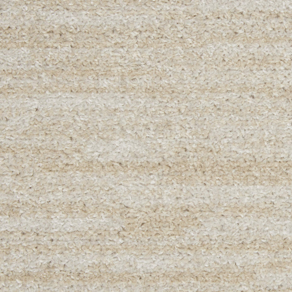 Nourison rug displayed in a dining area
