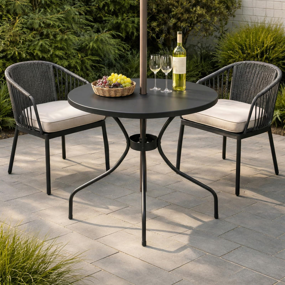 Novabright patio table with umbrella in a garden setting