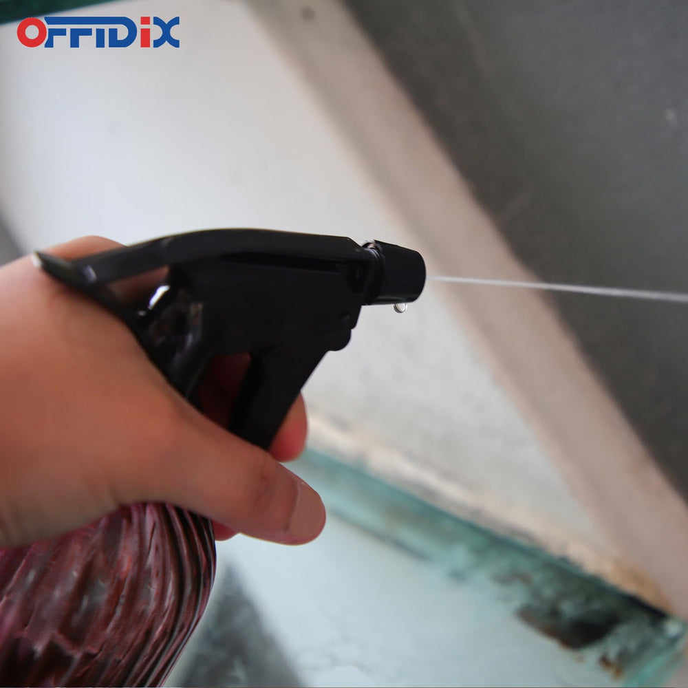 OFFIDIX Glass Spray Bottle in use watering plants