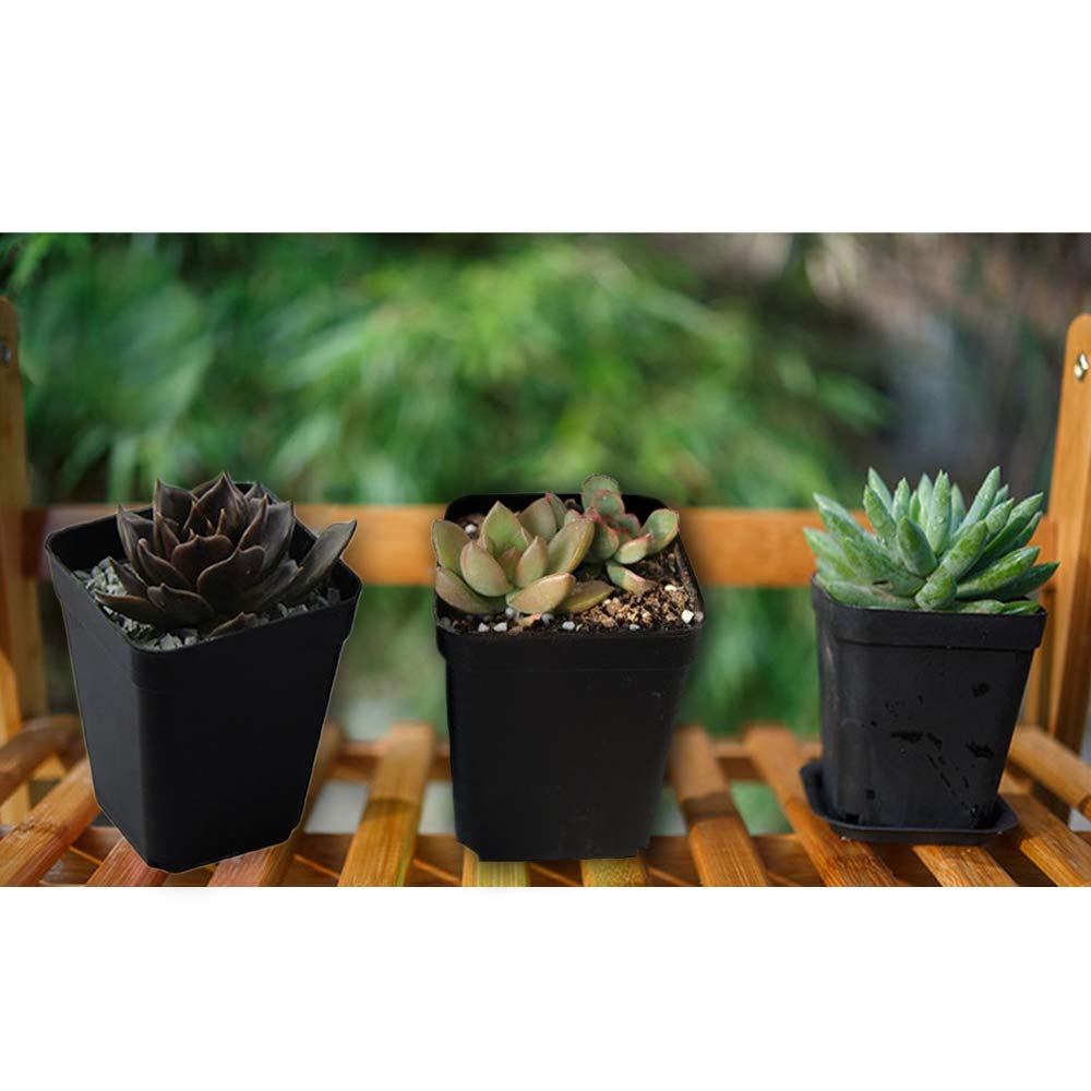 OJYUDD black nursery pots in a garden setting