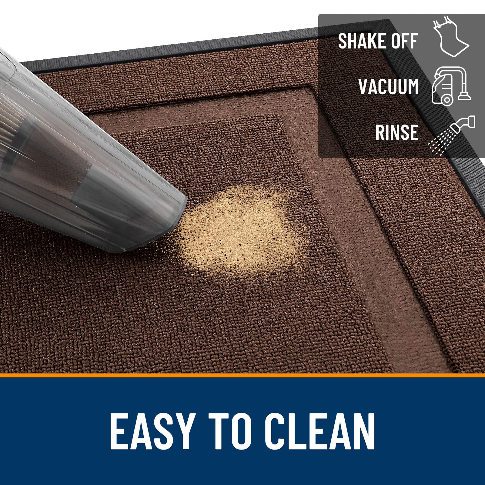 OLANLY doormat being cleaned with a garden hose