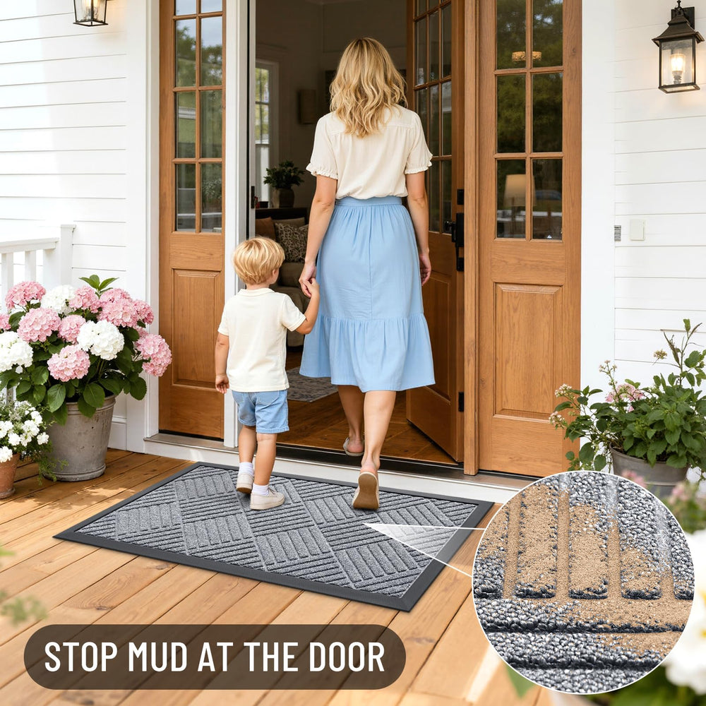 OLANLY doormat being cleaned with water