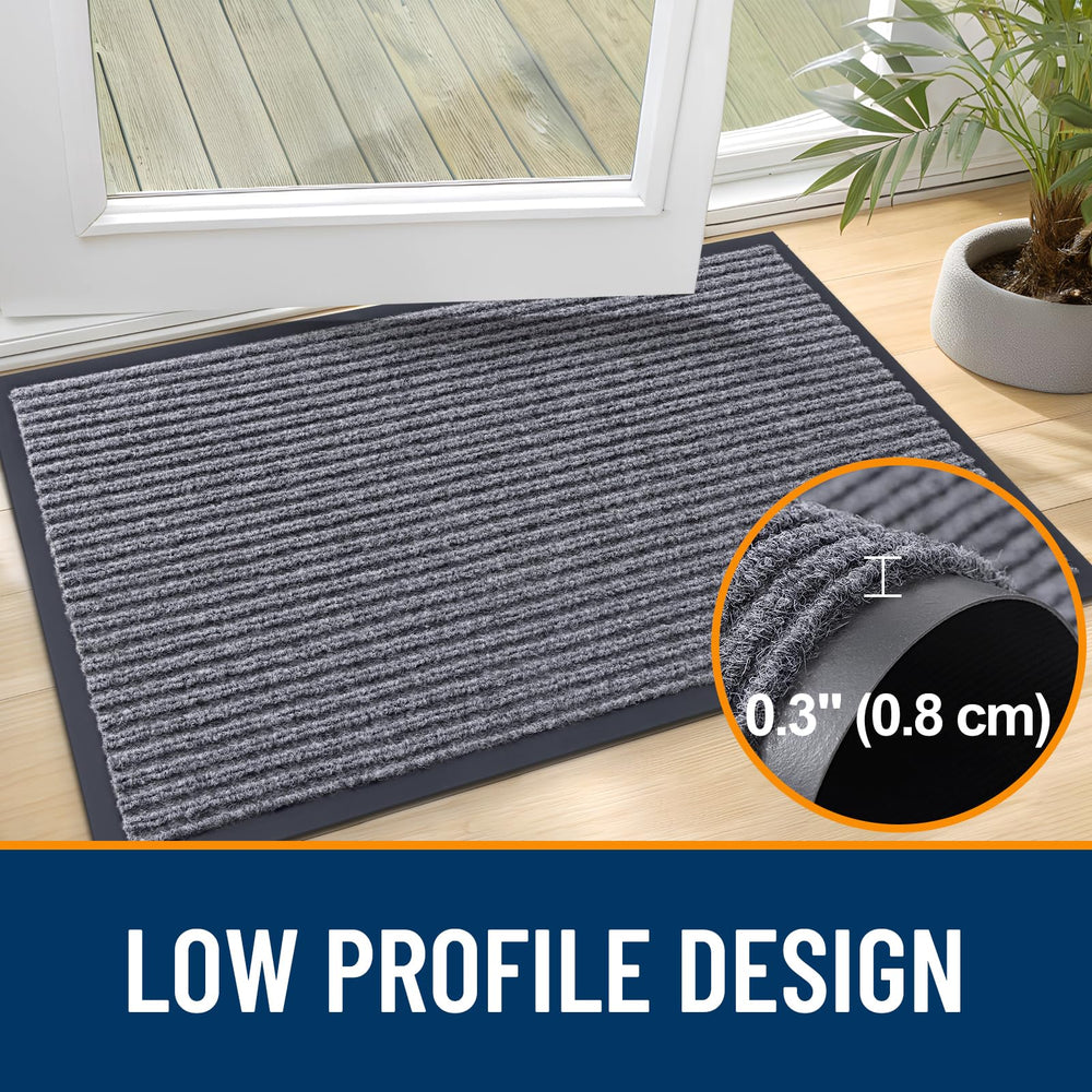 OLANLY Front Door Mat 71x30 in a front door setting