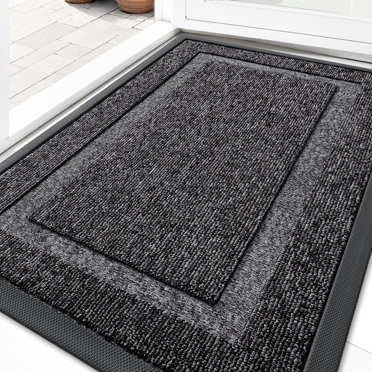 OLANLY Heavy-Duty Rubber Doormat front view, black and white design
