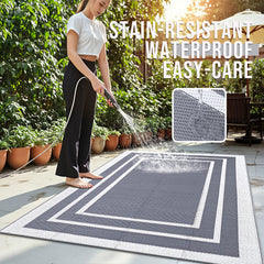OLANLY Outdoor Rug in a picnic setting on a grass lawn