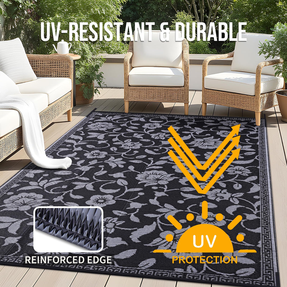 OLANLY outdoor rug laid out on patio with floral design