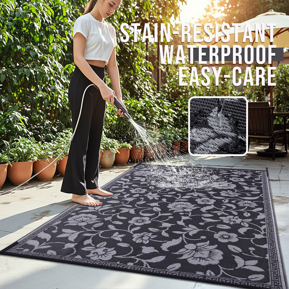 OLANLY outdoor rug rolled up in carrying case