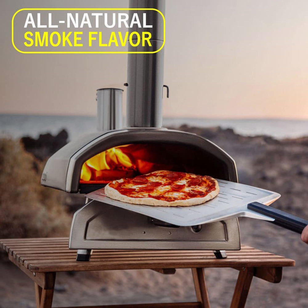 Old Potters cooking logs in use with pizza oven