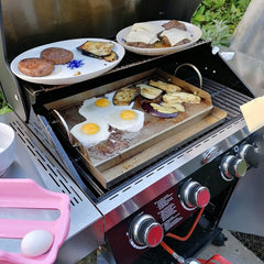 onlyfire Stainless Steel Cooking Griddle on a gas grill