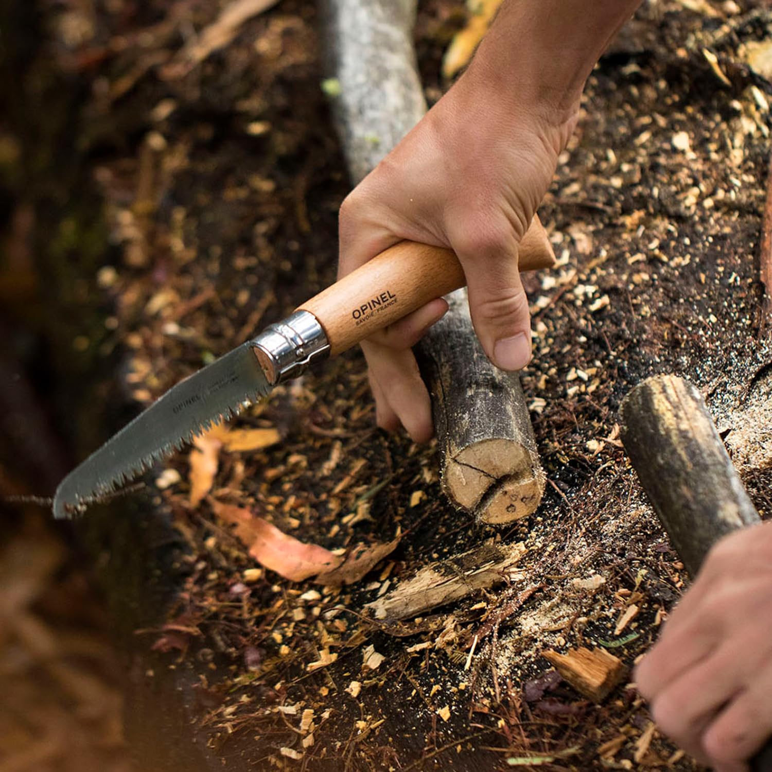 OPINEL Folding Saw size comparison in hand