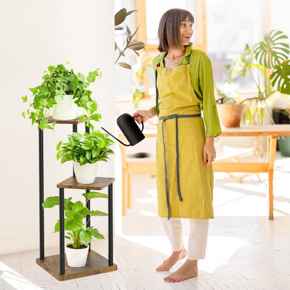 Oppro 3 Tier Plant Stand in black with decorative plants