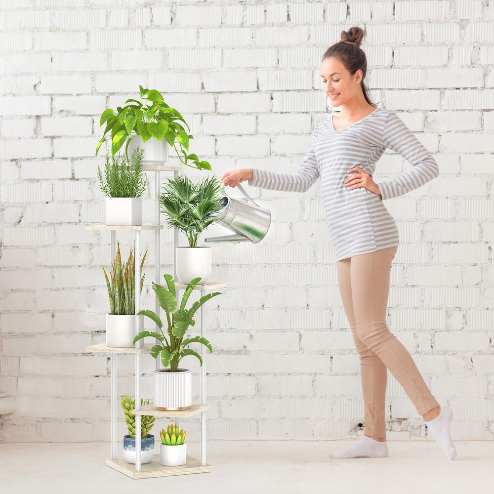 Oppro 6 Tier Tall Plant Stand in a corner of a room