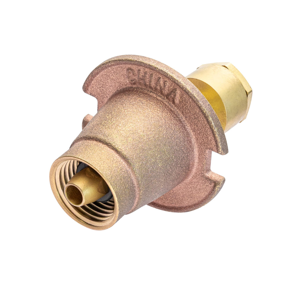 Orbit Brass Pop-Up Sprinkler in a garden setting