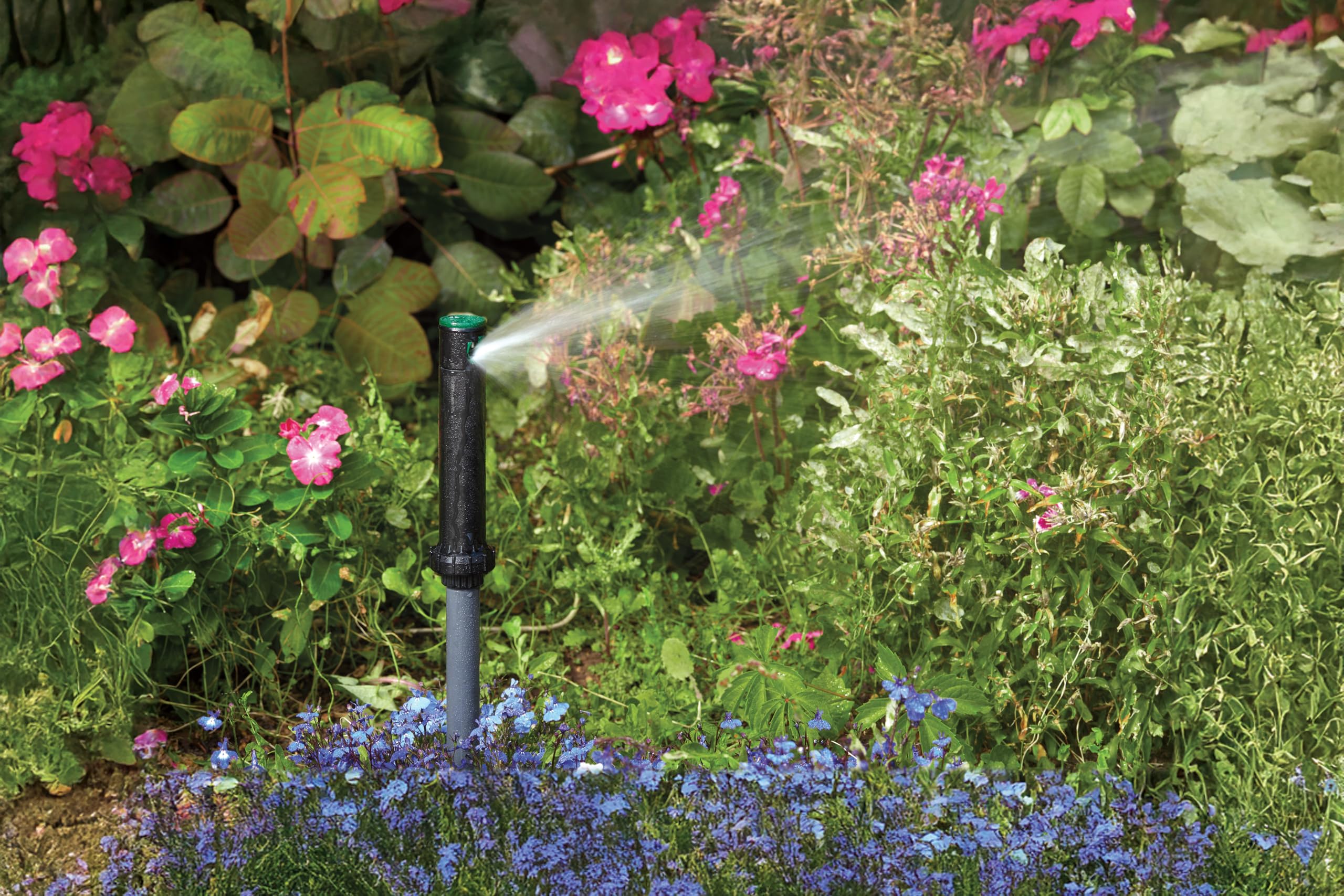 Orbit Titan Sprinkler installed in a garden setting