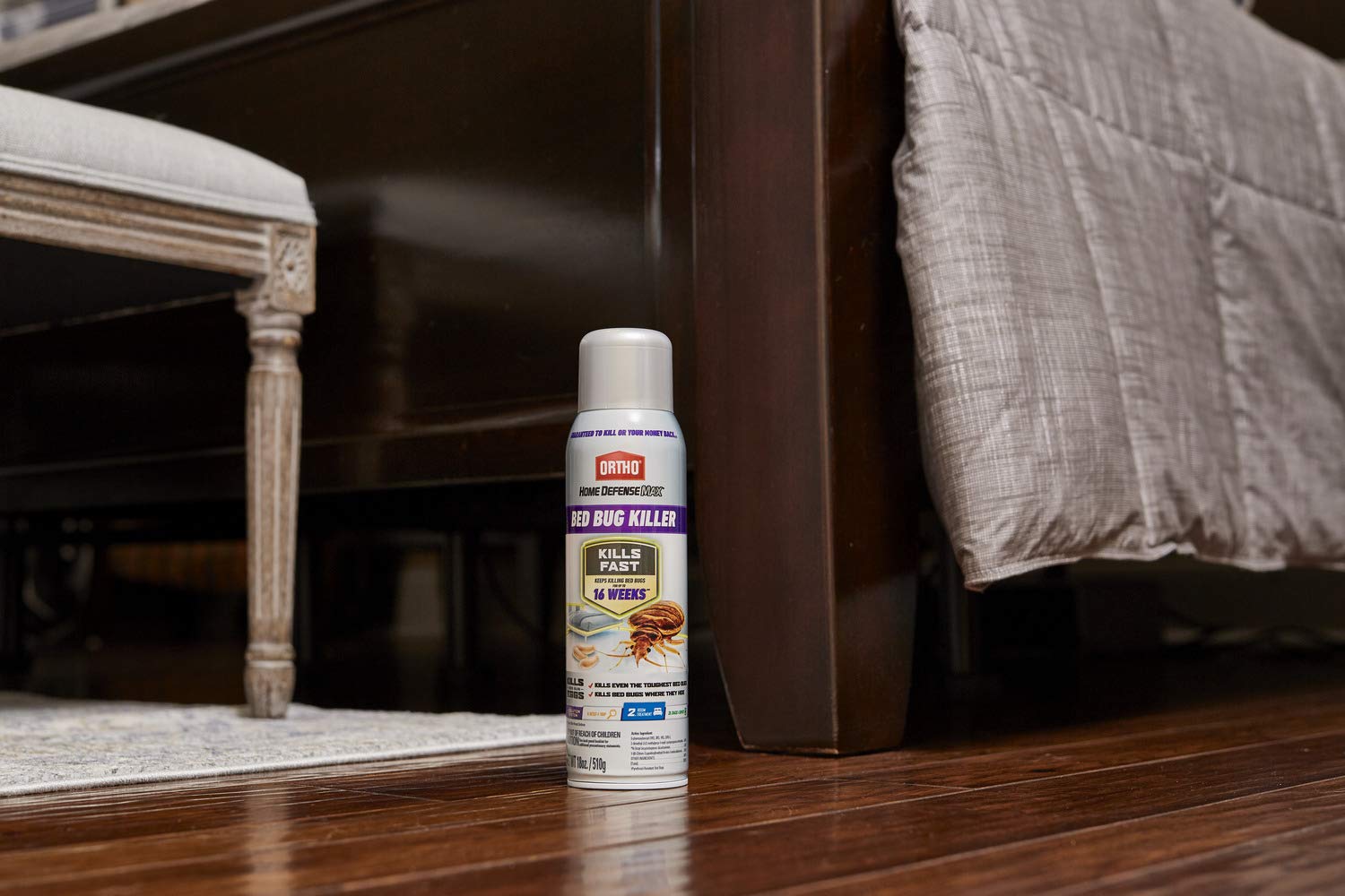 Ortho Home Defense Max Bed Bug Killer Spray on a wooden floor