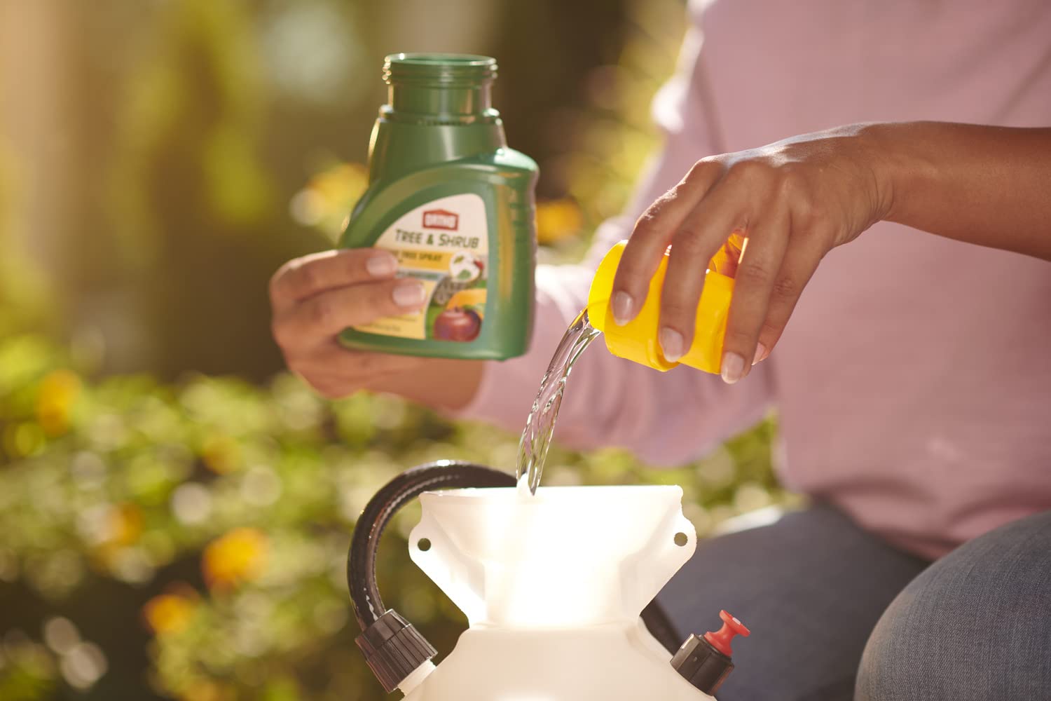 Ortho Tree & Shrub Fruit Tree Spray Concentrate 16 fl oz in use on garden plants