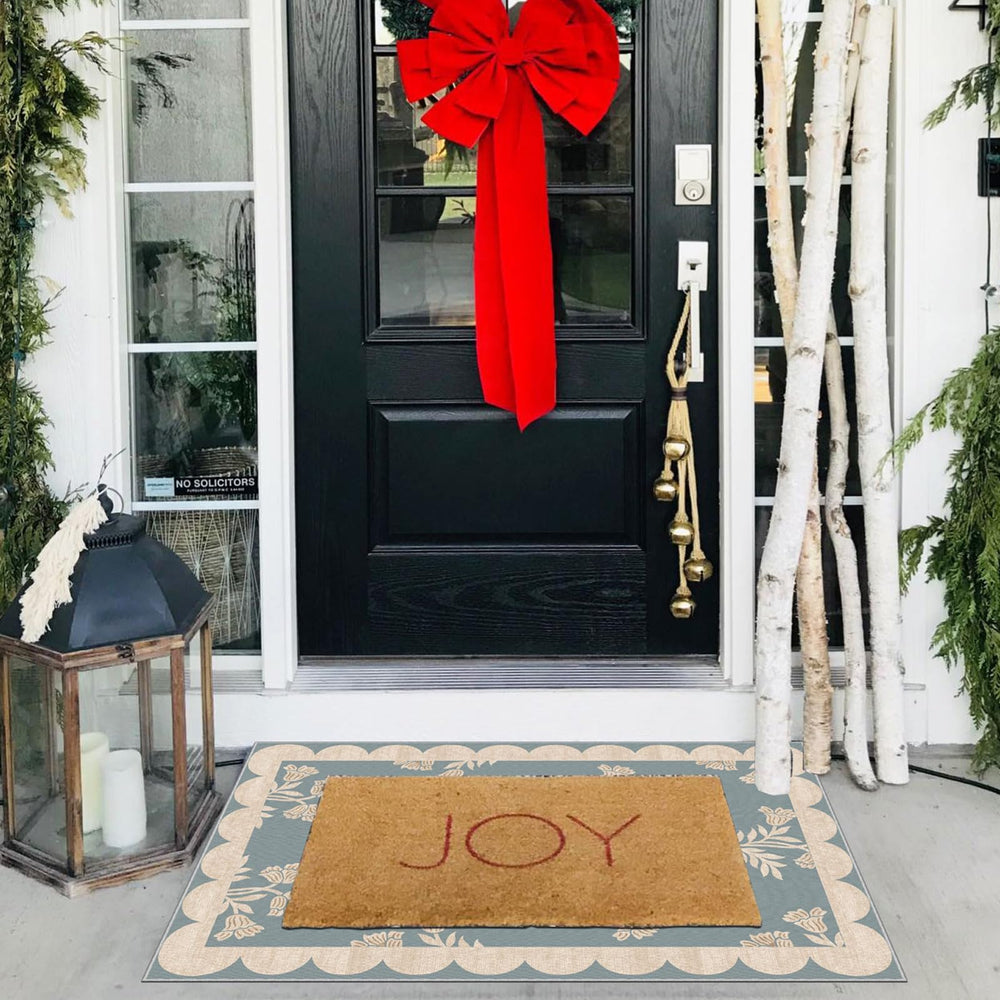 Othilic Front Door Mat laid flat in an entryway