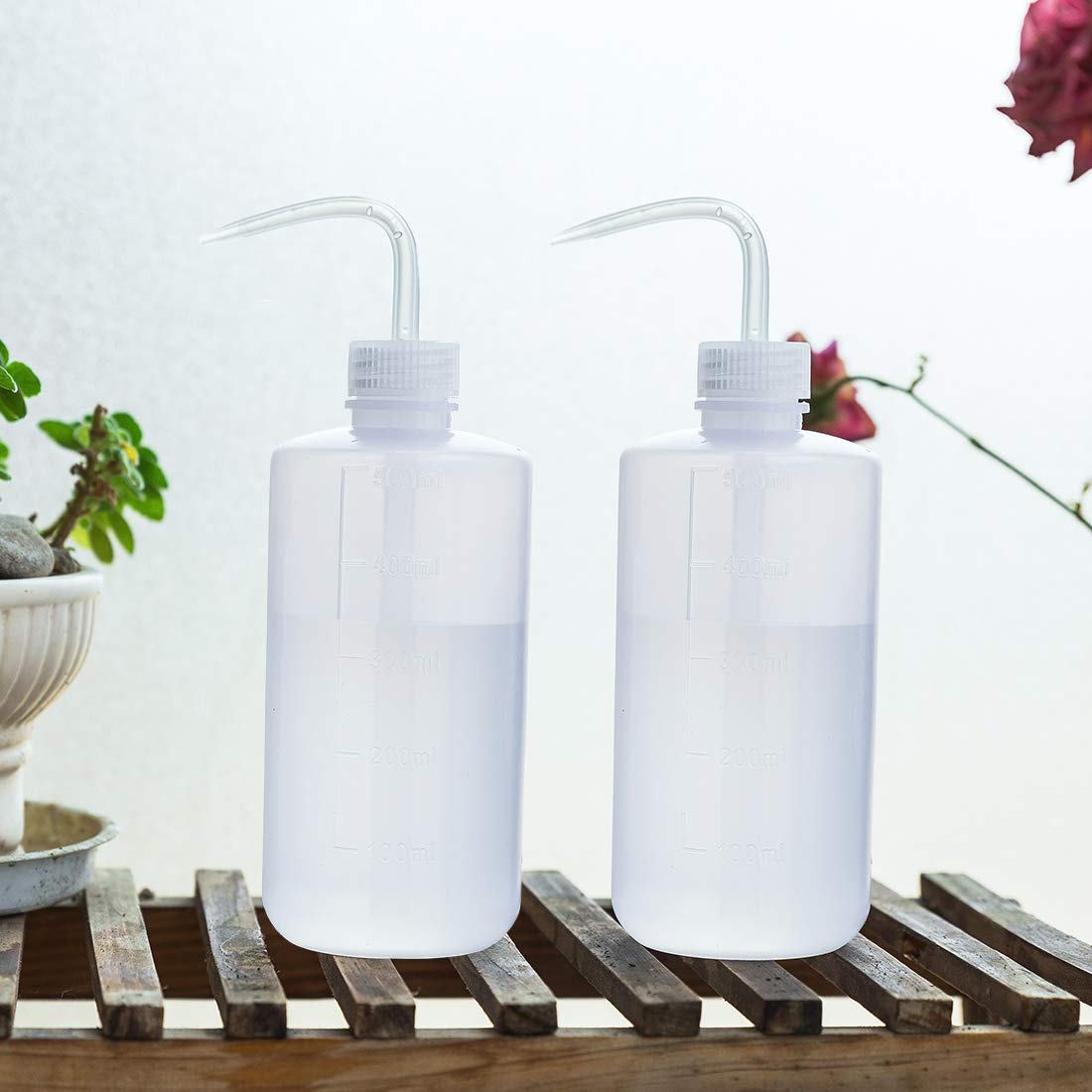Oubest watering bottle with bending nozzle design
