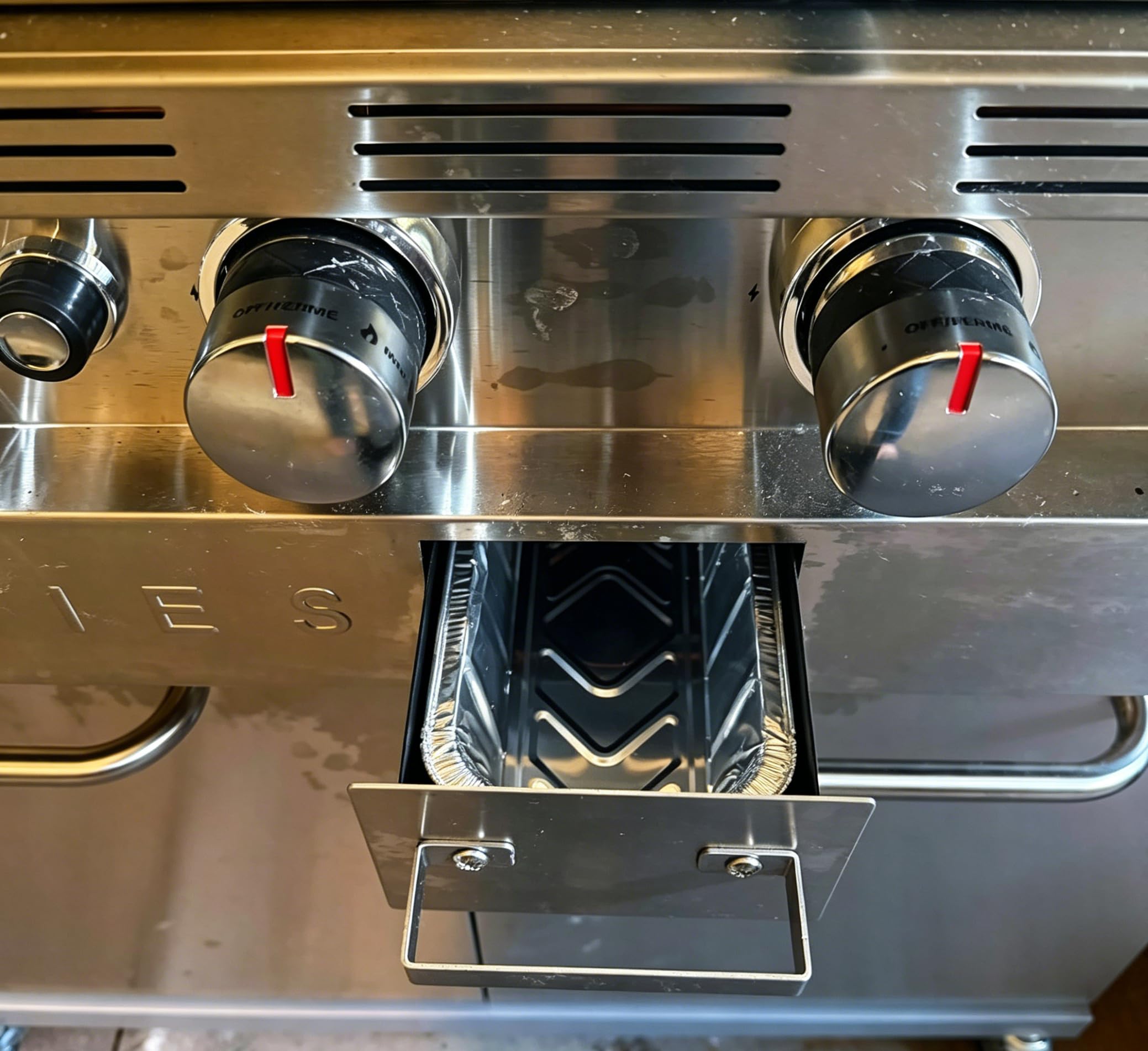 Outdoor BBQ setup with WEBROIL Grill Liner