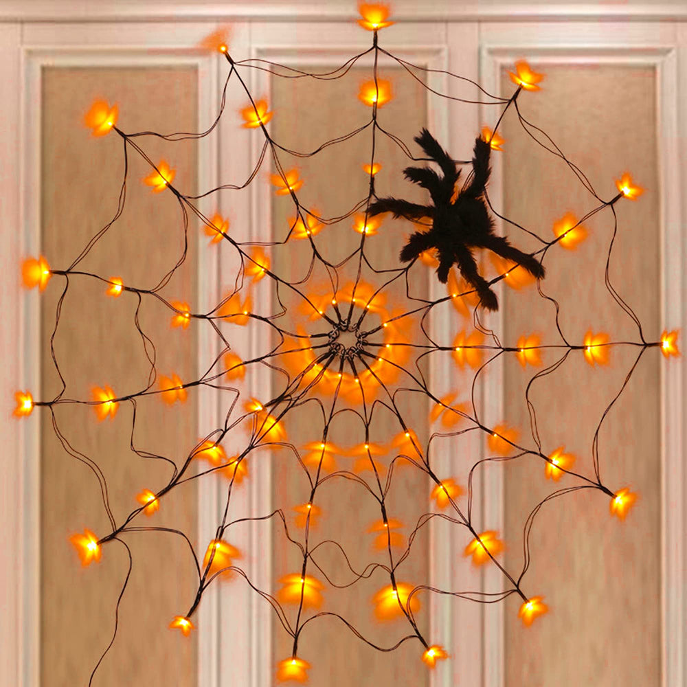 Outdoor display of FUNPENY Halloween spider web decoration