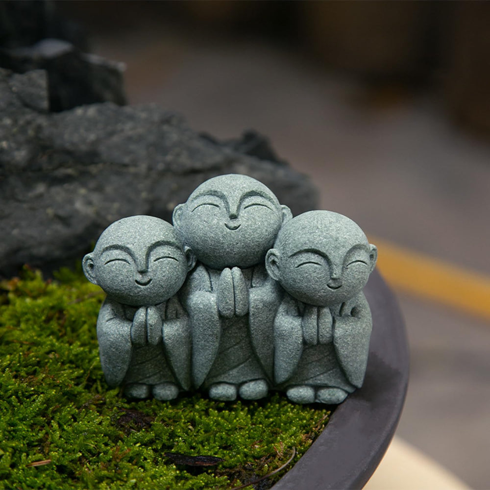 OwMell Jizo Monk Buddha Statue with flower pot background