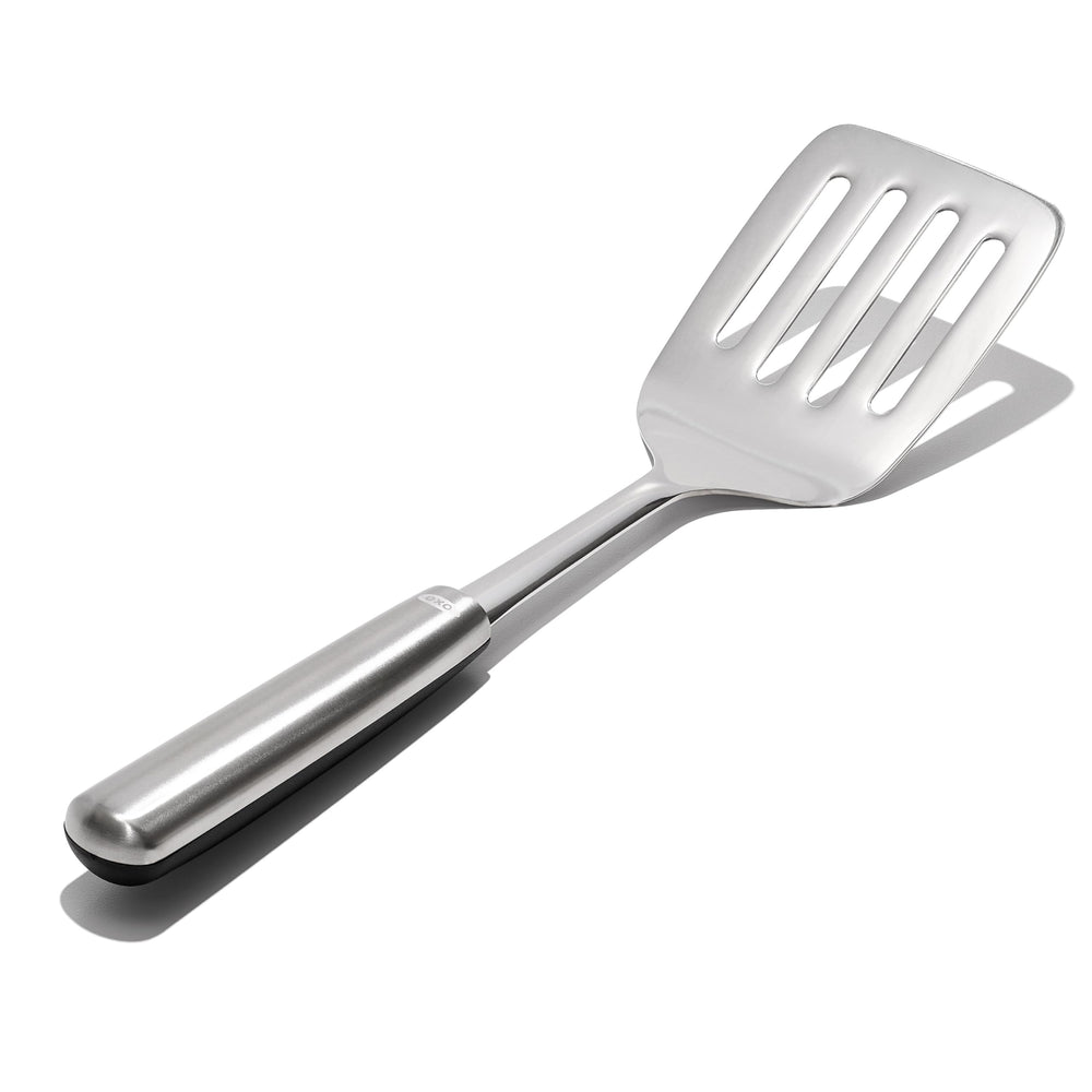 OXO Steel Cooking Turner showing non-slip grip handle