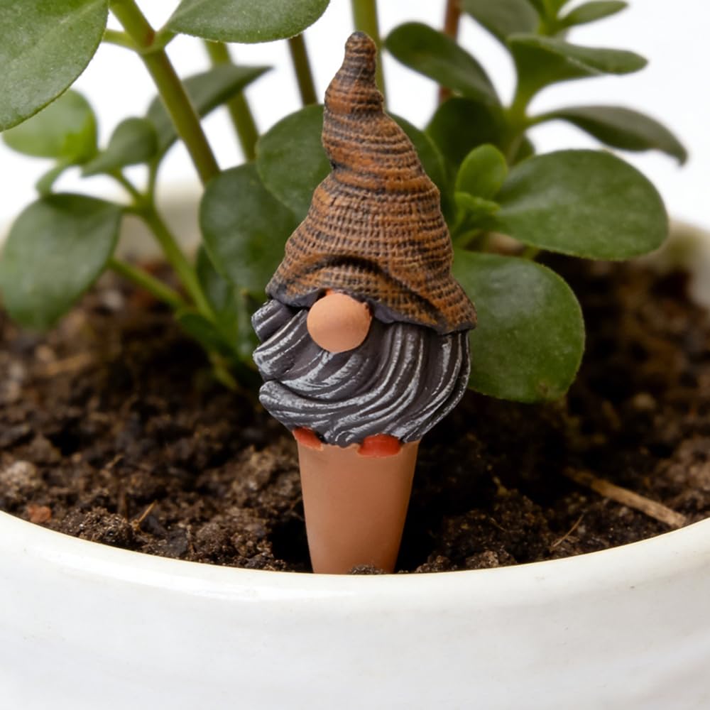 Pack of four terracotta watering spikes in original packaging