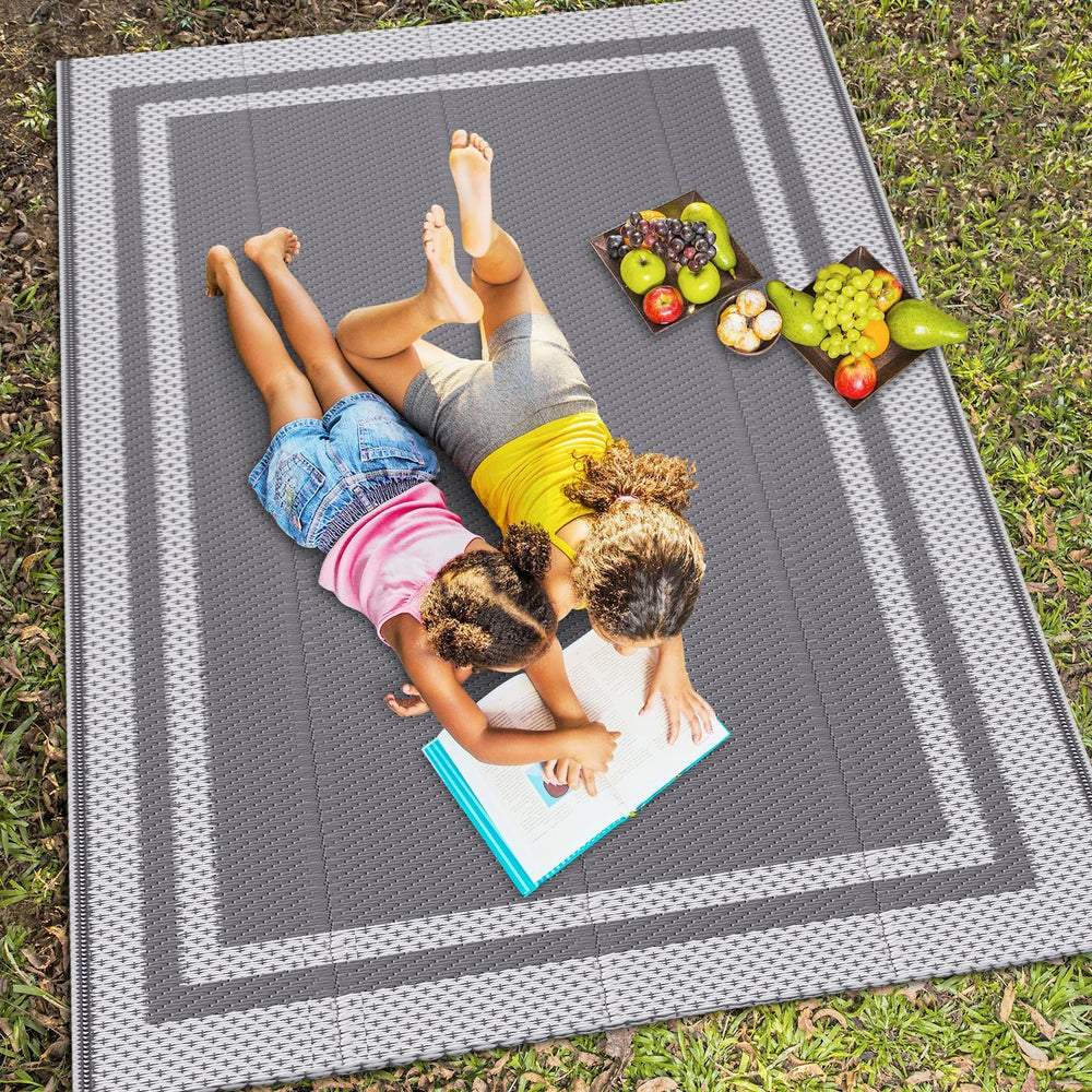 Packaging of HappyTrends Outdoor Rug 5' x 8'